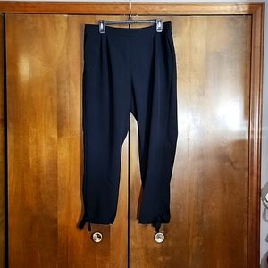 Black Ann Taylor dress pants cute detail on pant leg at bottom by ankle